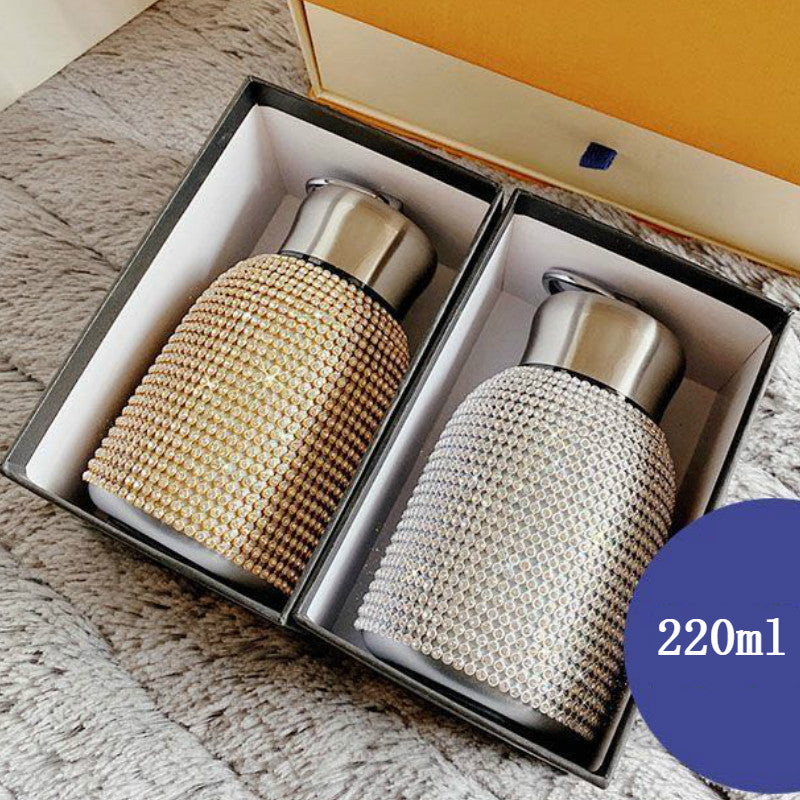 Stainless steel diamond-encrusted pot belly vacuum flask